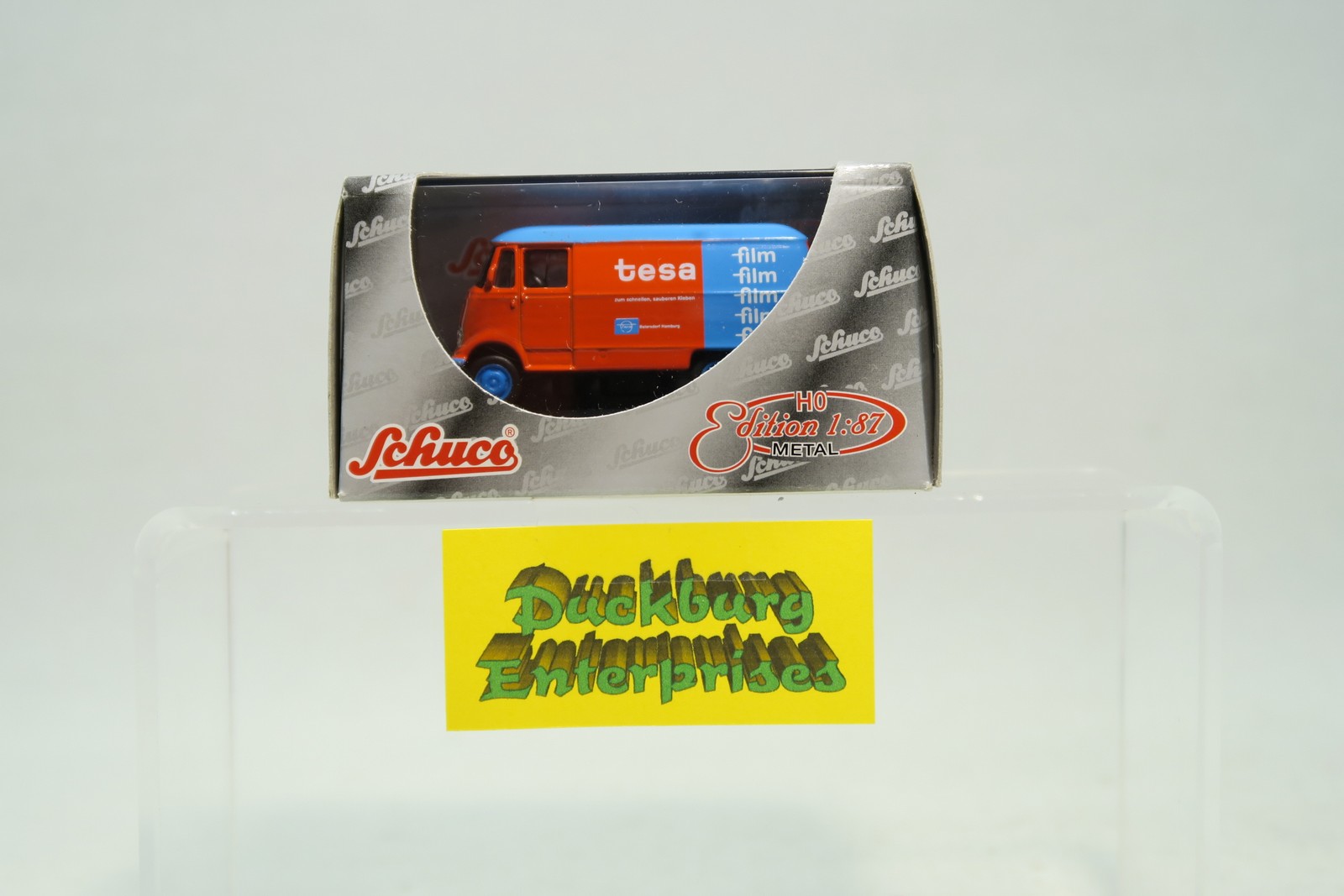Schuco 1:87 25224 Mercedes Benz L319 Tesa Werbung rot blau in OVP 173779 Schuco 1:87 25224 Mercedes Benz L319 Tesa Werbung rot blau in OVP 173779