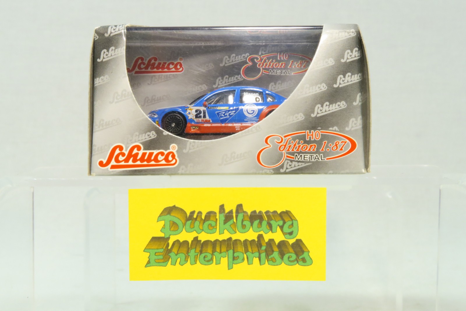 Schuco 1:87 PKW 21620 V8 Star 1st Choice Racing Nissen #21 in OVP 185209 Schuco 1:87 PKW 21620 V8 Star 1st Choice Racing Nissen #21 in OVP 185209